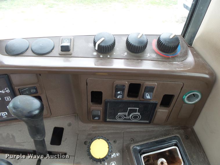 image for item DA2749 2002 John Deere 6420 MFWD tractor