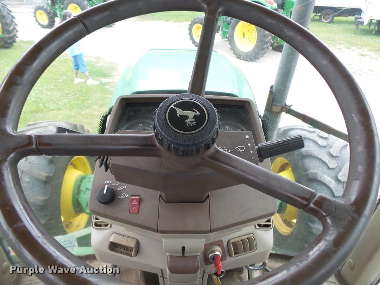 image for item DA2749 2002 John Deere 6420 MFWD tractor