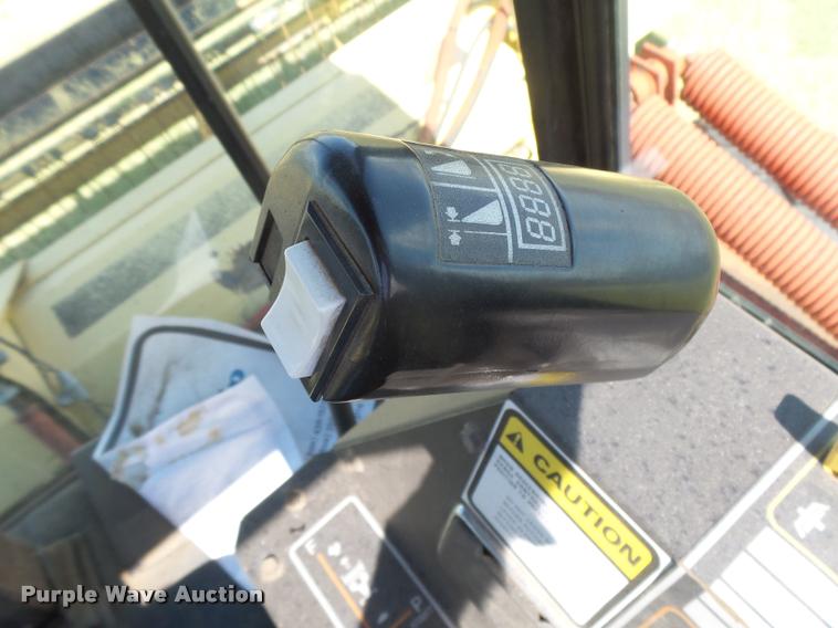 image for item DB2675 1995 New Holland 2550 self-propelled windrower