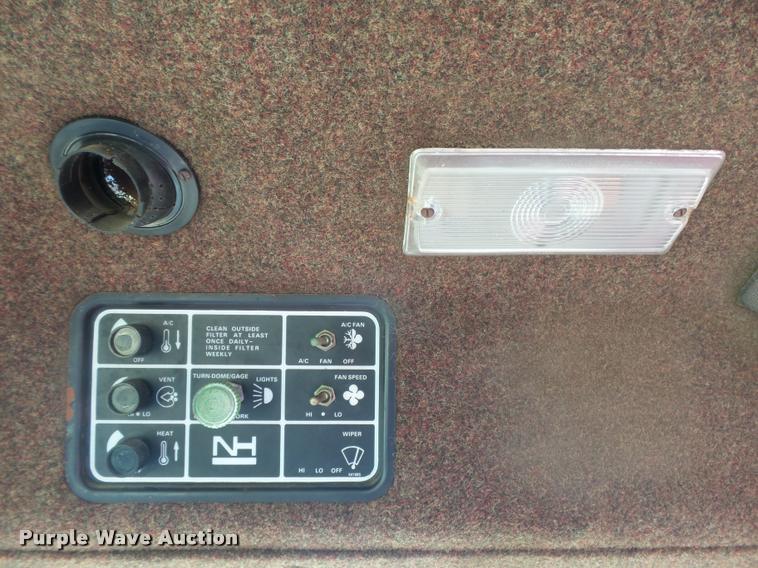 image for item DB2675 1995 New Holland 2550 self-propelled windrower