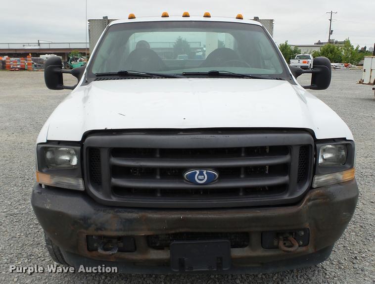 image for item DA1090 2004 Ford F350 Super Duty XL SuperCab utility bed pickup truck