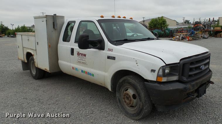 image for item DA1090 2004 Ford F350 Super Duty XL SuperCab utility bed pickup truck
