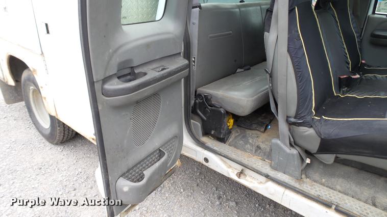 image for item DA1090 2004 Ford F350 Super Duty XL SuperCab utility bed pickup truck