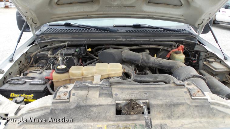 image for item DA1090 2004 Ford F350 Super Duty XL SuperCab utility bed pickup truck