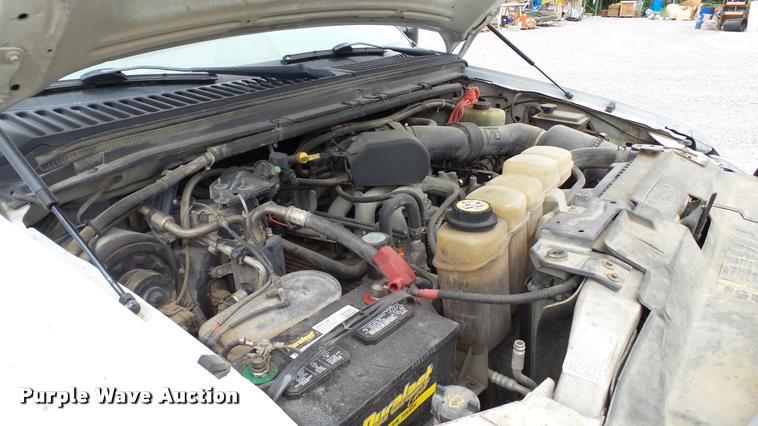 image for item DA1090 2004 Ford F350 Super Duty XL SuperCab utility bed pickup truck