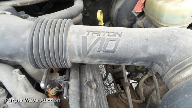 image for item DA1090 2004 Ford F350 Super Duty XL SuperCab utility bed pickup truck