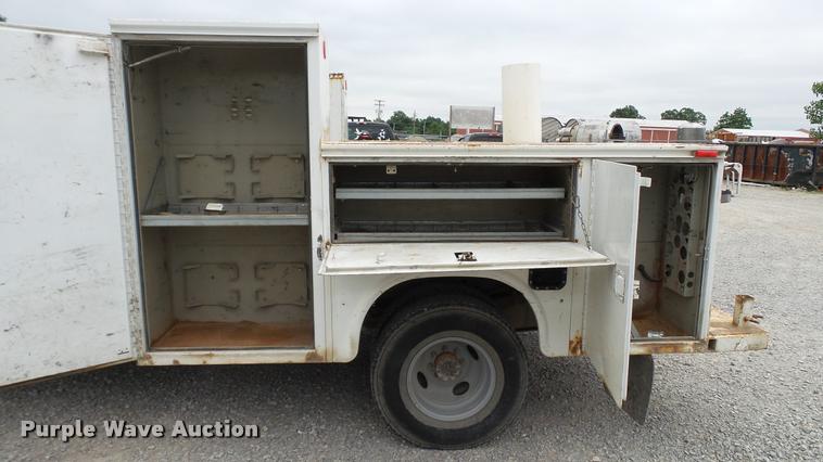 image for item DA1090 2004 Ford F350 Super Duty XL SuperCab utility bed pickup truck