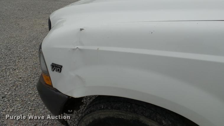 image for item DA1090 2004 Ford F350 Super Duty XL SuperCab utility bed pickup truck