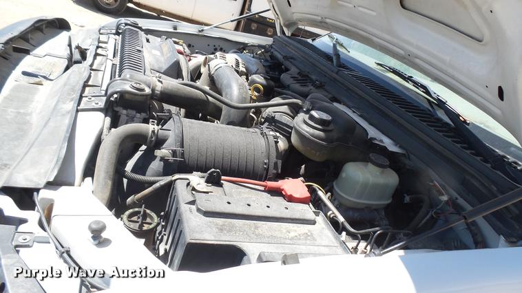 image for item DA7994 2006 Ford F250 Super Duty SuperCab flatbed pickup truck