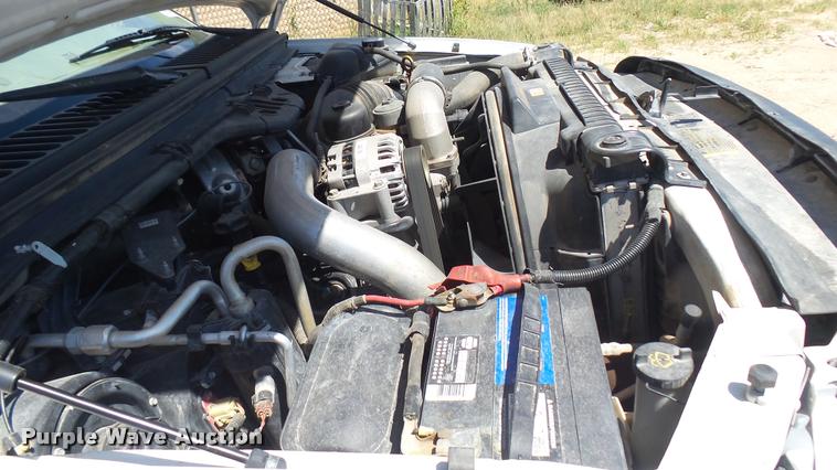 image for item DA7994 2006 Ford F250 Super Duty SuperCab flatbed pickup truck