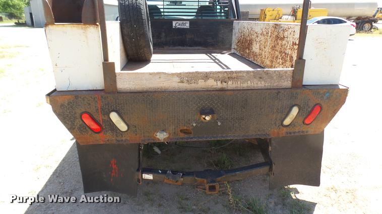 image for item DA7994 2006 Ford F250 Super Duty SuperCab flatbed pickup truck