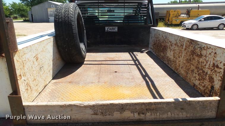 image for item DA7994 2006 Ford F250 Super Duty SuperCab flatbed pickup truck