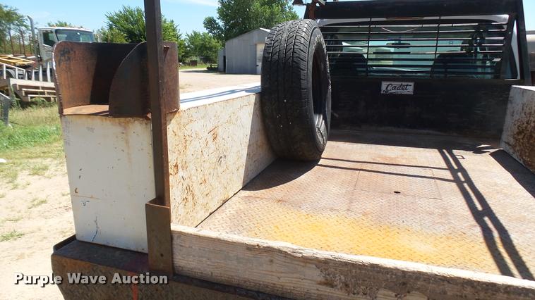 image for item DA7994 2006 Ford F250 Super Duty SuperCab flatbed pickup truck