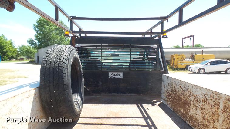 image for item DA7994 2006 Ford F250 Super Duty SuperCab flatbed pickup truck