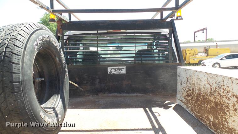 image for item DA7994 2006 Ford F250 Super Duty SuperCab flatbed pickup truck