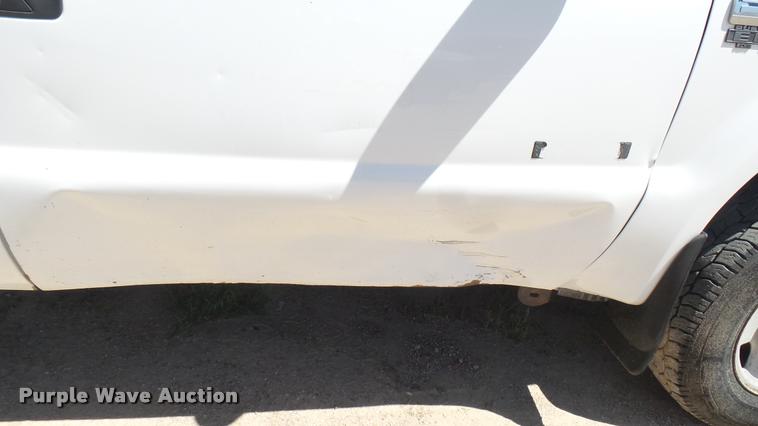 image for item DA7994 2006 Ford F250 Super Duty SuperCab flatbed pickup truck