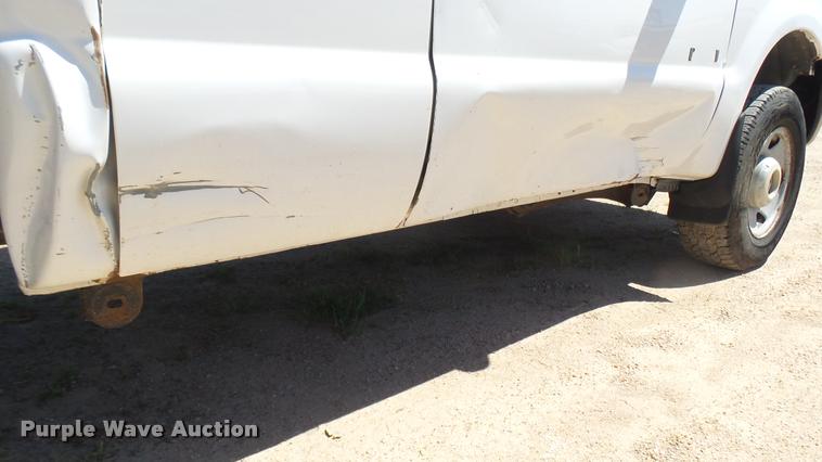 image for item DA7994 2006 Ford F250 Super Duty SuperCab flatbed pickup truck