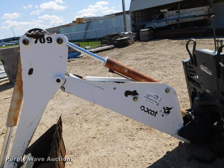 image for item DB9397 Melroe Bobcat 709 skid steer backhoe