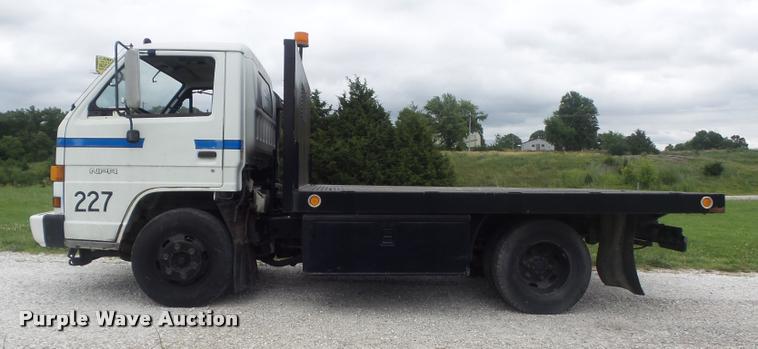 image for item K7591 1994 Isuzu NPR flatbed truck