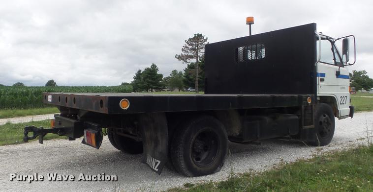 image for item K7591 1994 Isuzu NPR flatbed truck