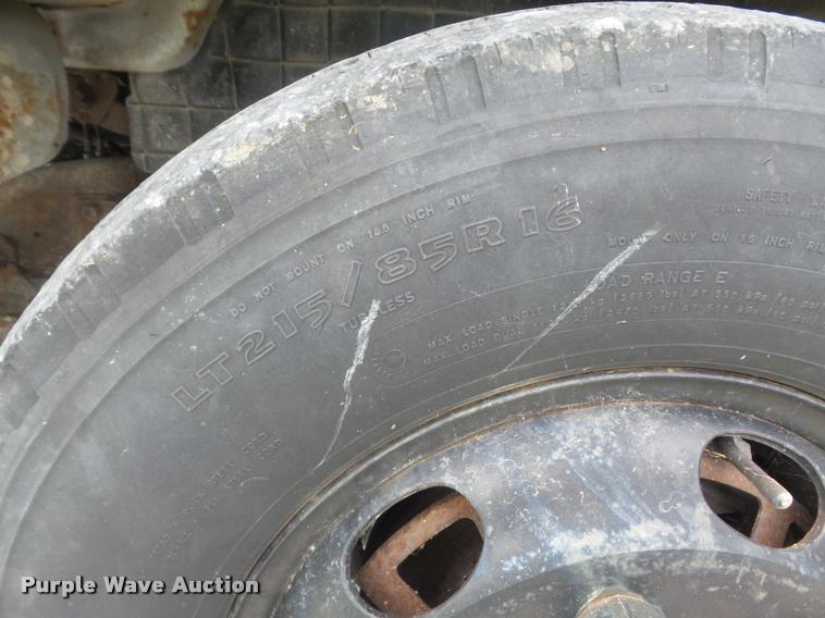 image for item K7591 1994 Isuzu NPR flatbed truck