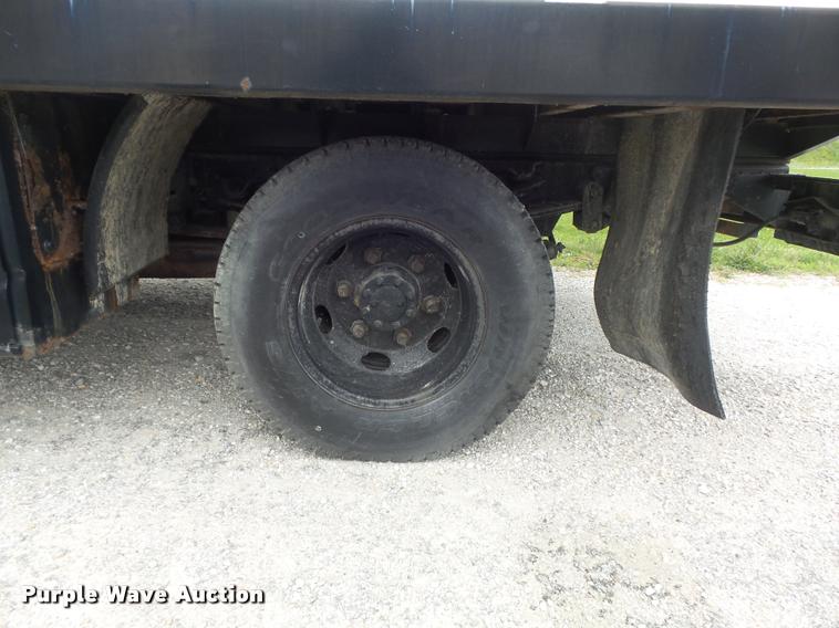 image for item K7591 1994 Isuzu NPR flatbed truck