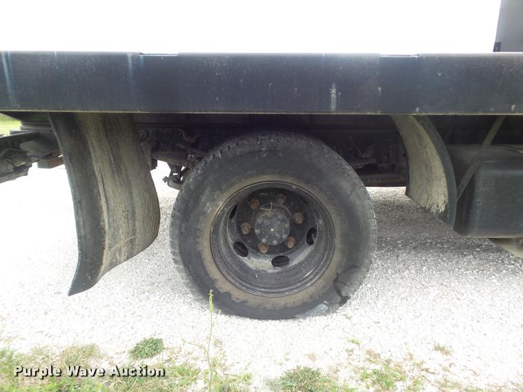 image for item K7591 1994 Isuzu NPR flatbed truck