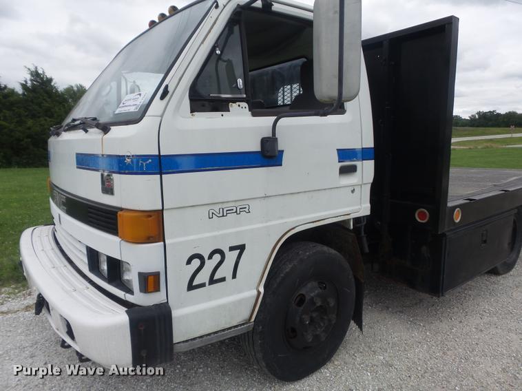 image for item K7591 1994 Isuzu NPR flatbed truck