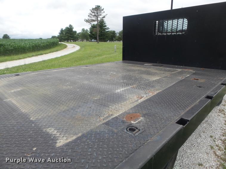 image for item K7591 1994 Isuzu NPR flatbed truck