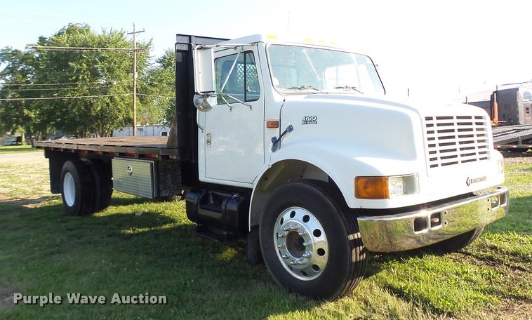 image for item DB1396 1999 International 4700 flatbed truck