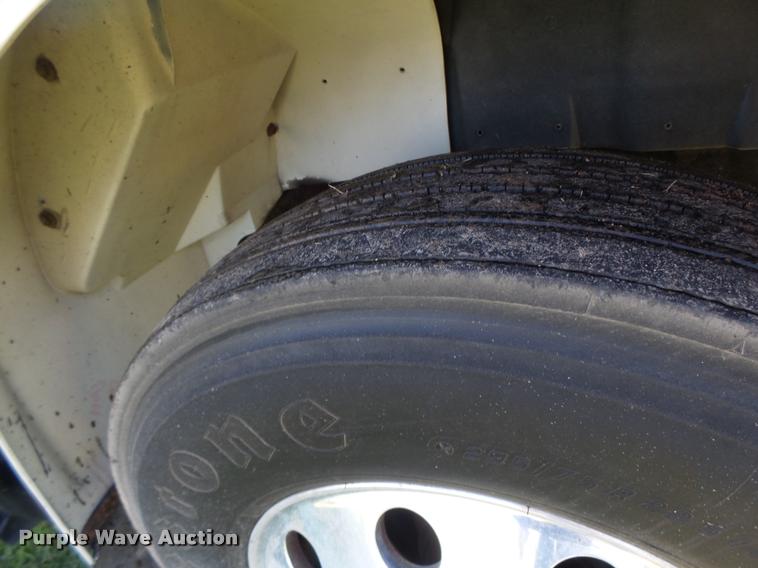 image for item DB1396 1999 International 4700 flatbed truck