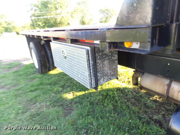 image for item DB1396 1999 International 4700 flatbed truck