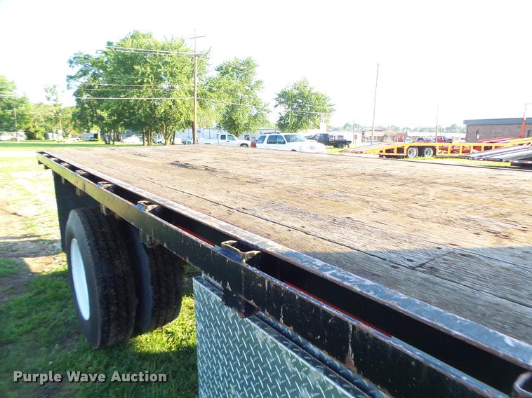 image for item DB1396 1999 International 4700 flatbed truck