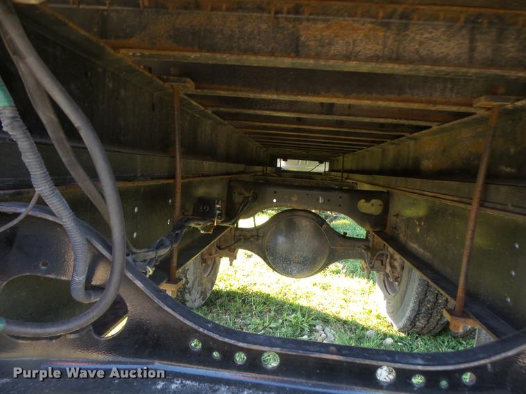 image for item DB1396 1999 International 4700 flatbed truck