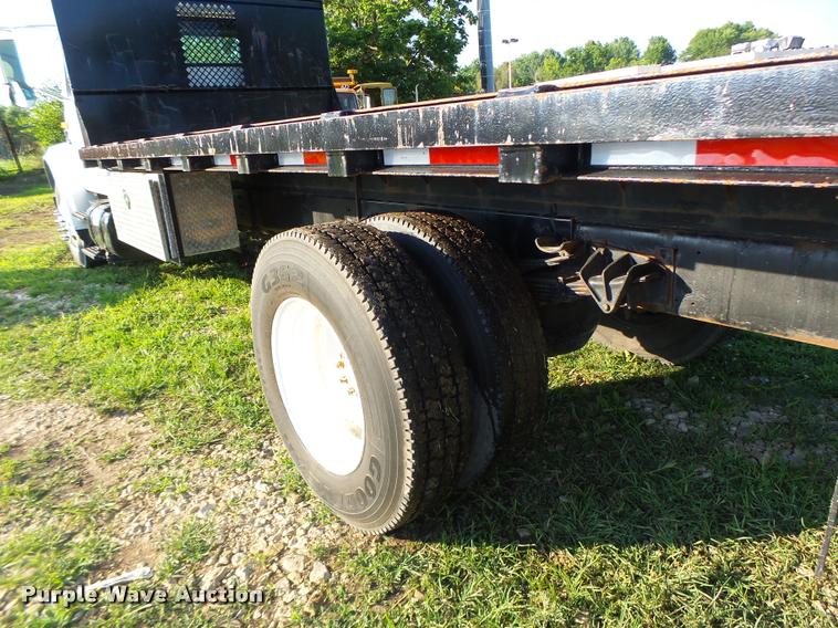 image for item DB1396 1999 International 4700 flatbed truck