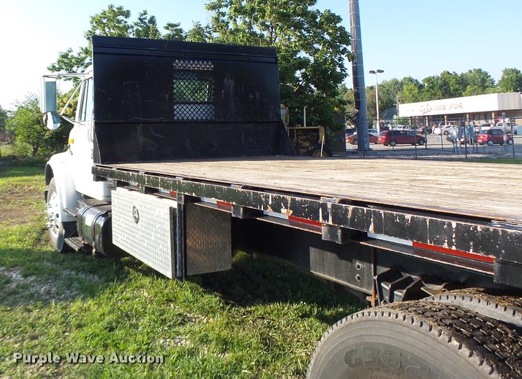 image for item DB1396 1999 International 4700 flatbed truck