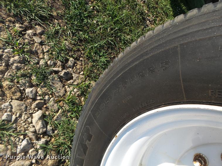 image for item DB1396 1999 International 4700 flatbed truck