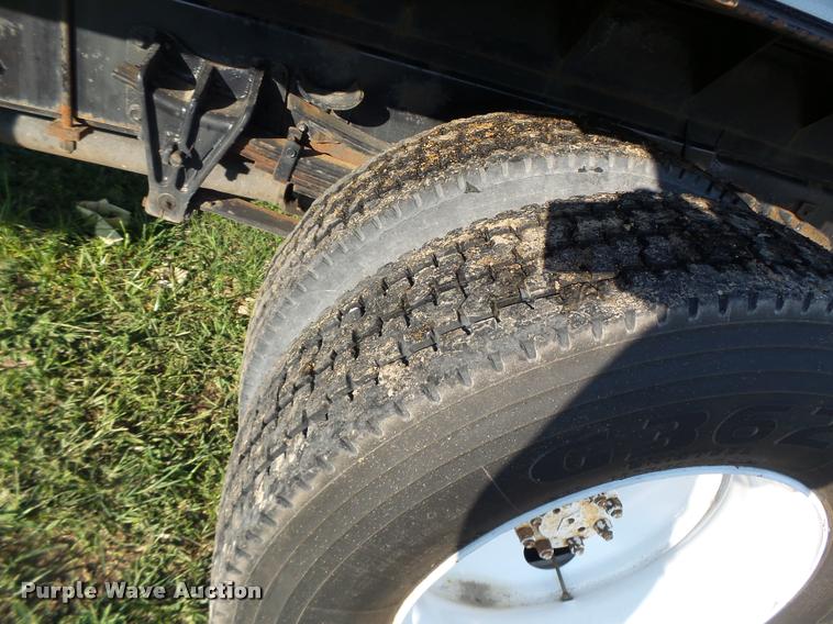 image for item DB1396 1999 International 4700 flatbed truck