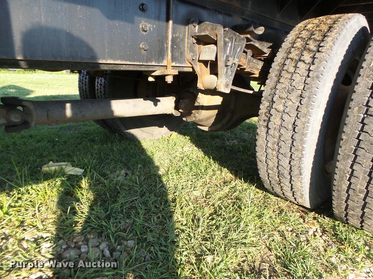 image for item DB1396 1999 International 4700 flatbed truck