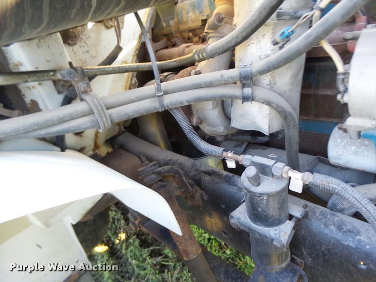 image for item DB1396 1999 International 4700 flatbed truck