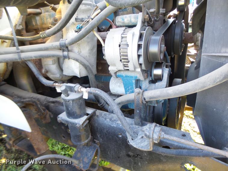 image for item DB1396 1999 International 4700 flatbed truck