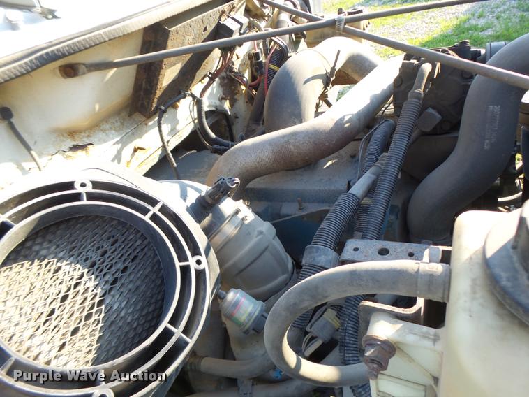 image for item DB1396 1999 International 4700 flatbed truck