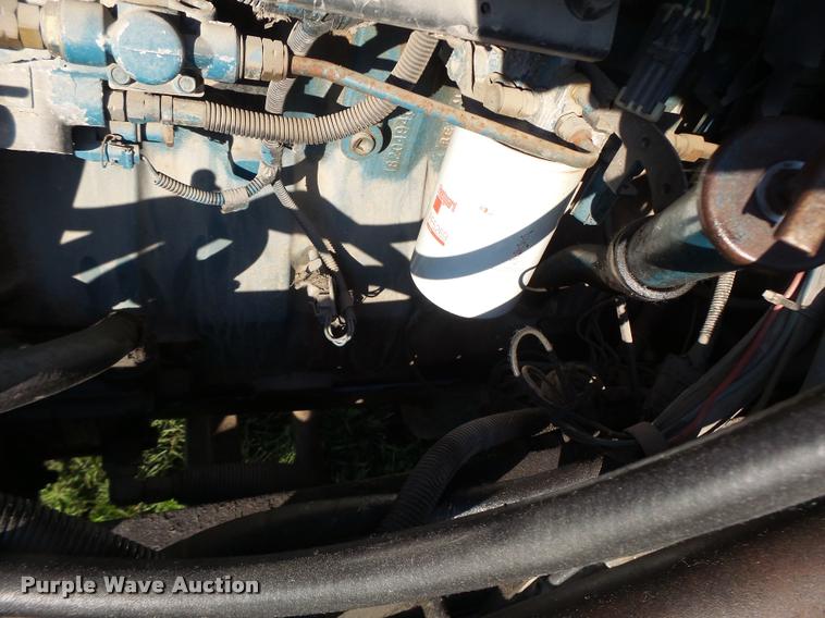 image for item DB1396 1999 International 4700 flatbed truck