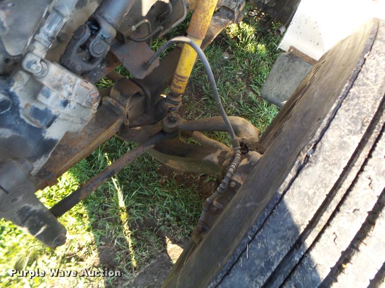 image for item DB1396 1999 International 4700 flatbed truck