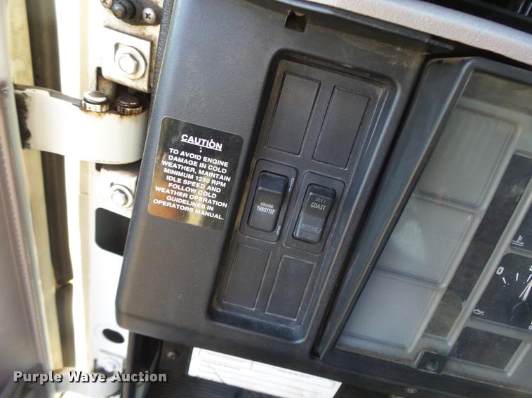 image for item DB1396 1999 International 4700 flatbed truck