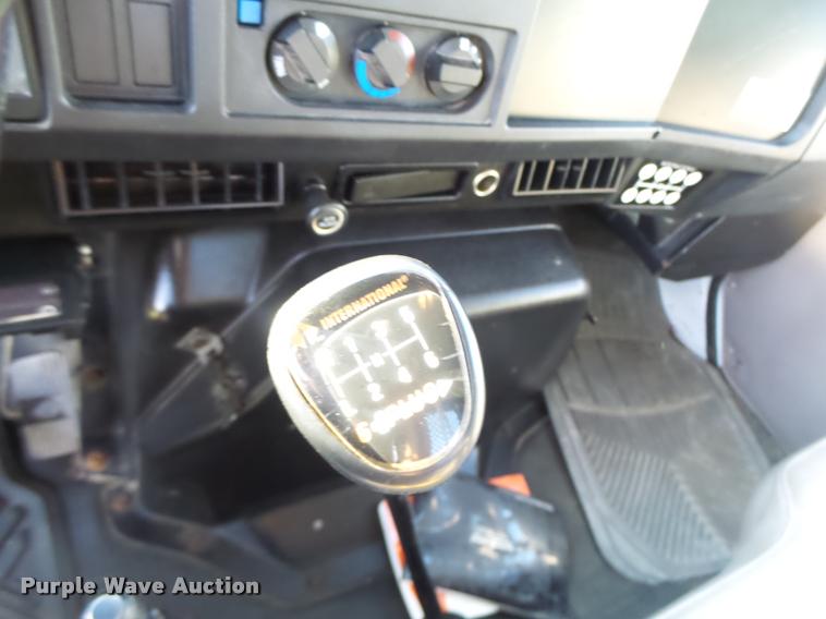 image for item DB1396 1999 International 4700 flatbed truck