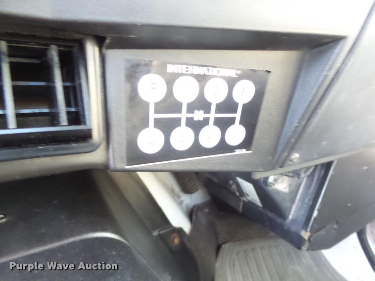 image for item DB1396 1999 International 4700 flatbed truck