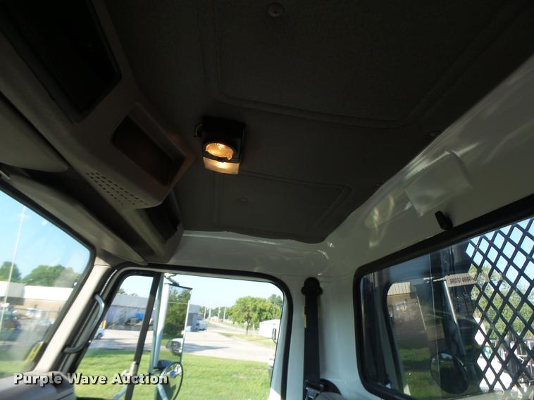 image for item DB1396 1999 International 4700 flatbed truck