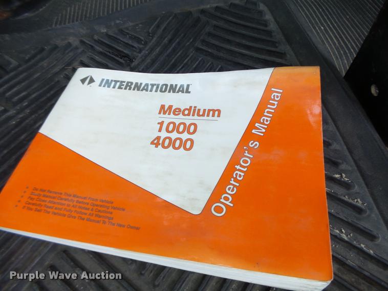 image for item DB1396 1999 International 4700 flatbed truck