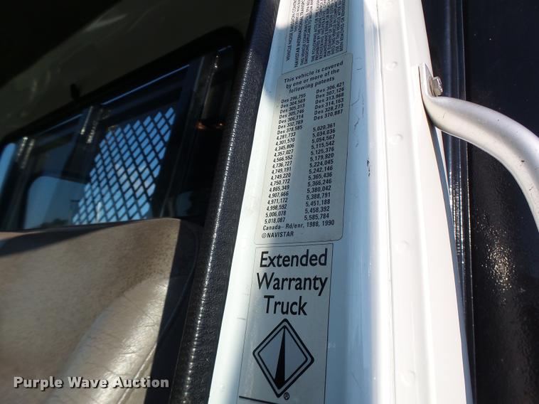 image for item DB1396 1999 International 4700 flatbed truck